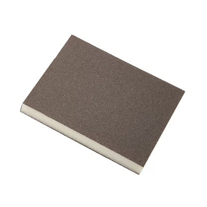Square sandpaper sheet with textured surface on a white background
