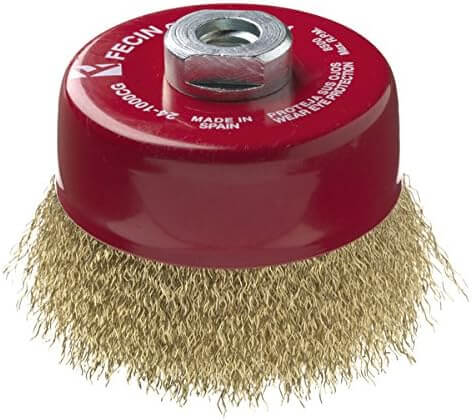 Red wire brush with visible brand name on a white background