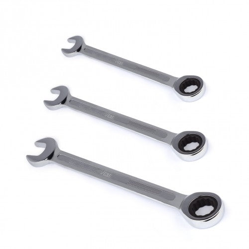 Three metallic ring spanners on a white background