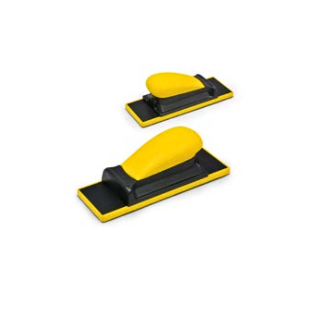 Two yellow and black hand blocks used for sanding.