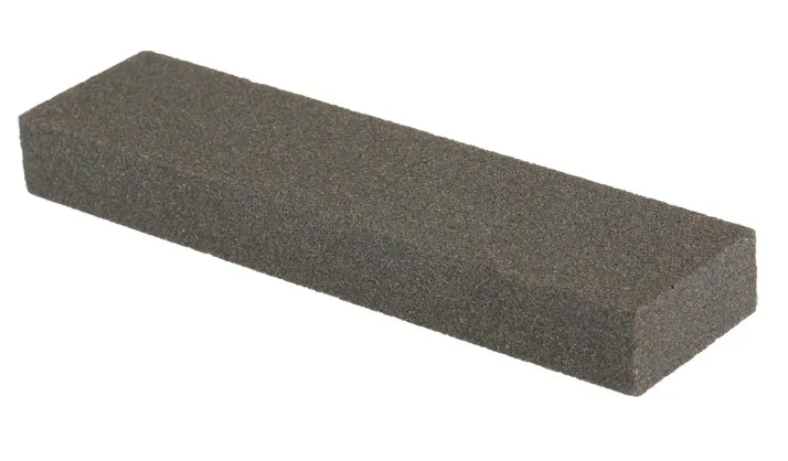 Rectangular sanding block on a white background