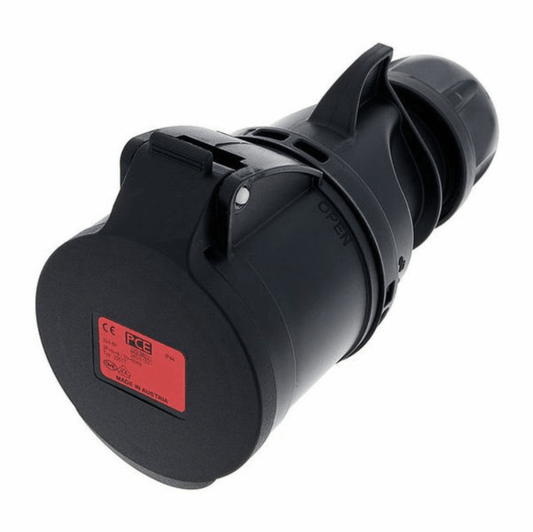Black electrical plug with a red label on a white background