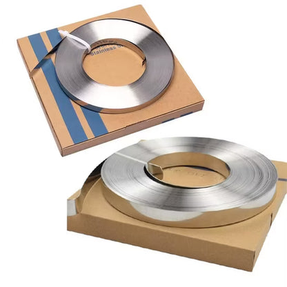 Two rolls of stainless steel strip on cardboard packaging with visible brand name.