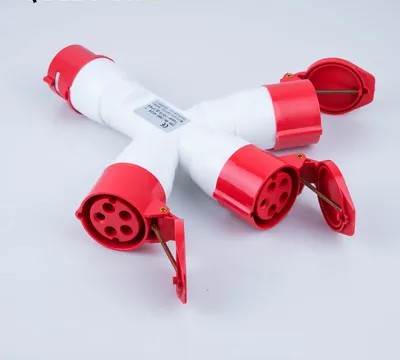Red and white electrical connector on a light gray background