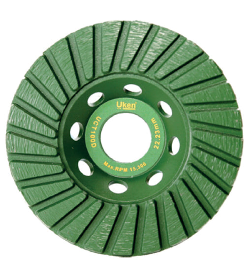 Green flap disc with Uken branding on a white background